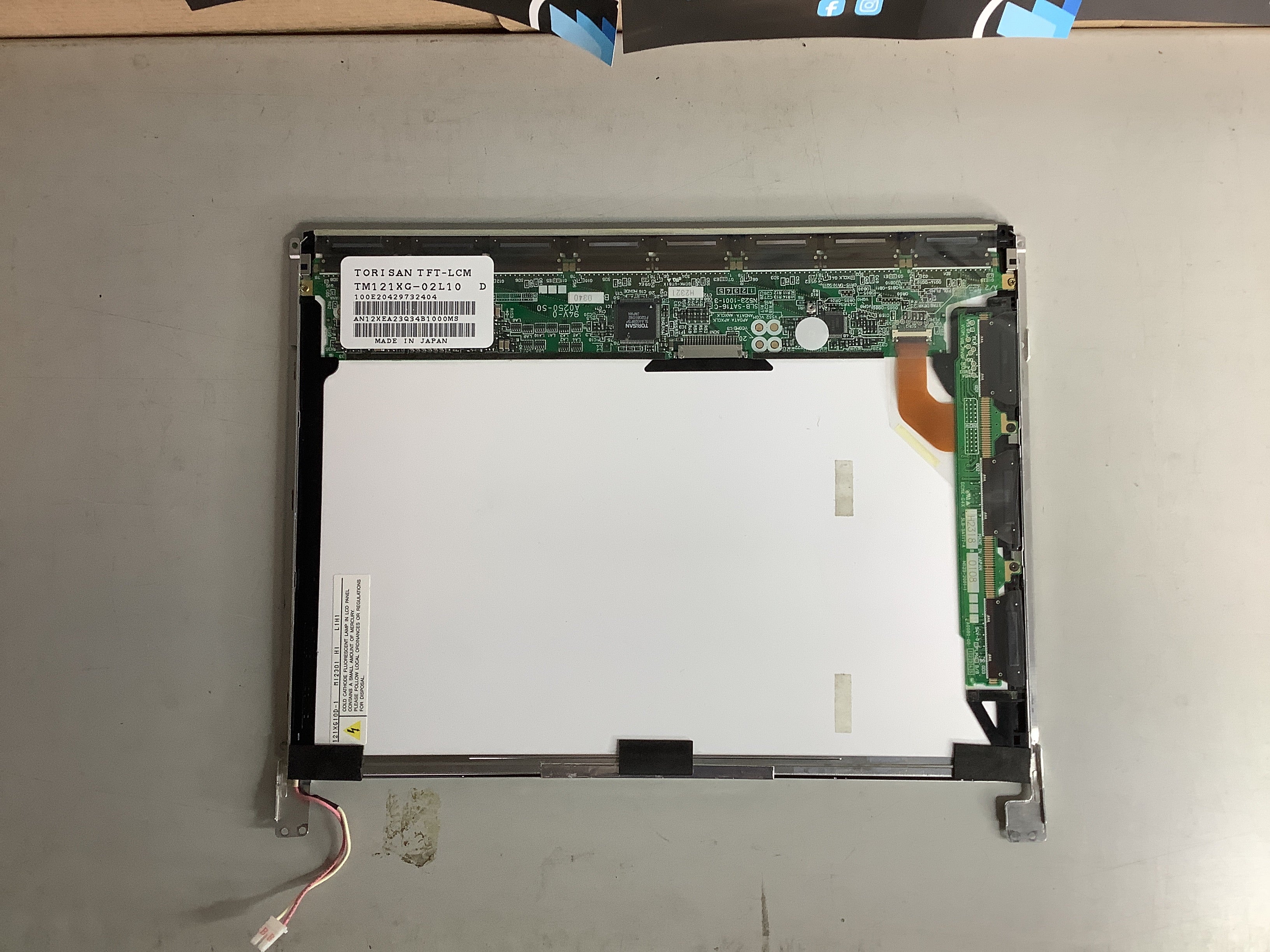 TM121XG-02L10 laptop screen image 3